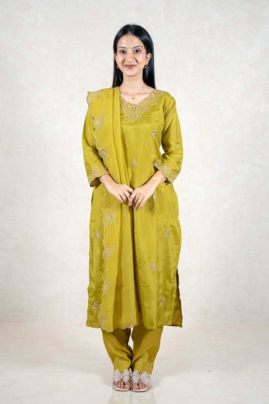 Raysham Fashion olive green silk blend kurta set with gold embroidery, matching trousers, and a scalloped dupatta.