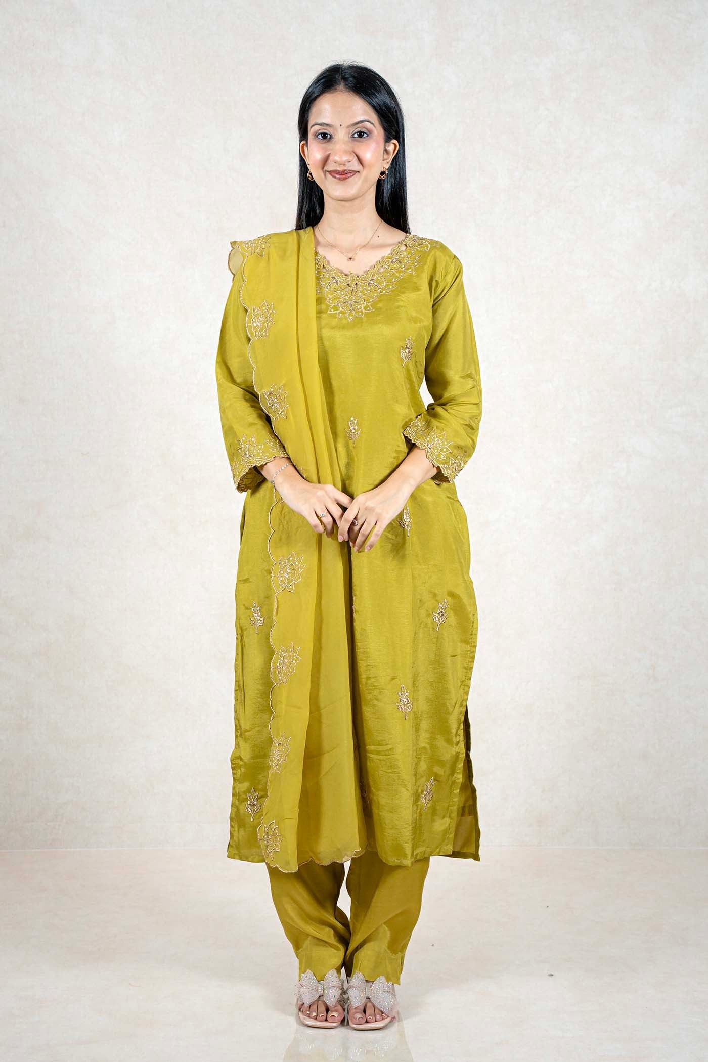 Raysham Fashion olive green silk blend kurta set with gold embroidery, matching trousers, and a scalloped dupatta.