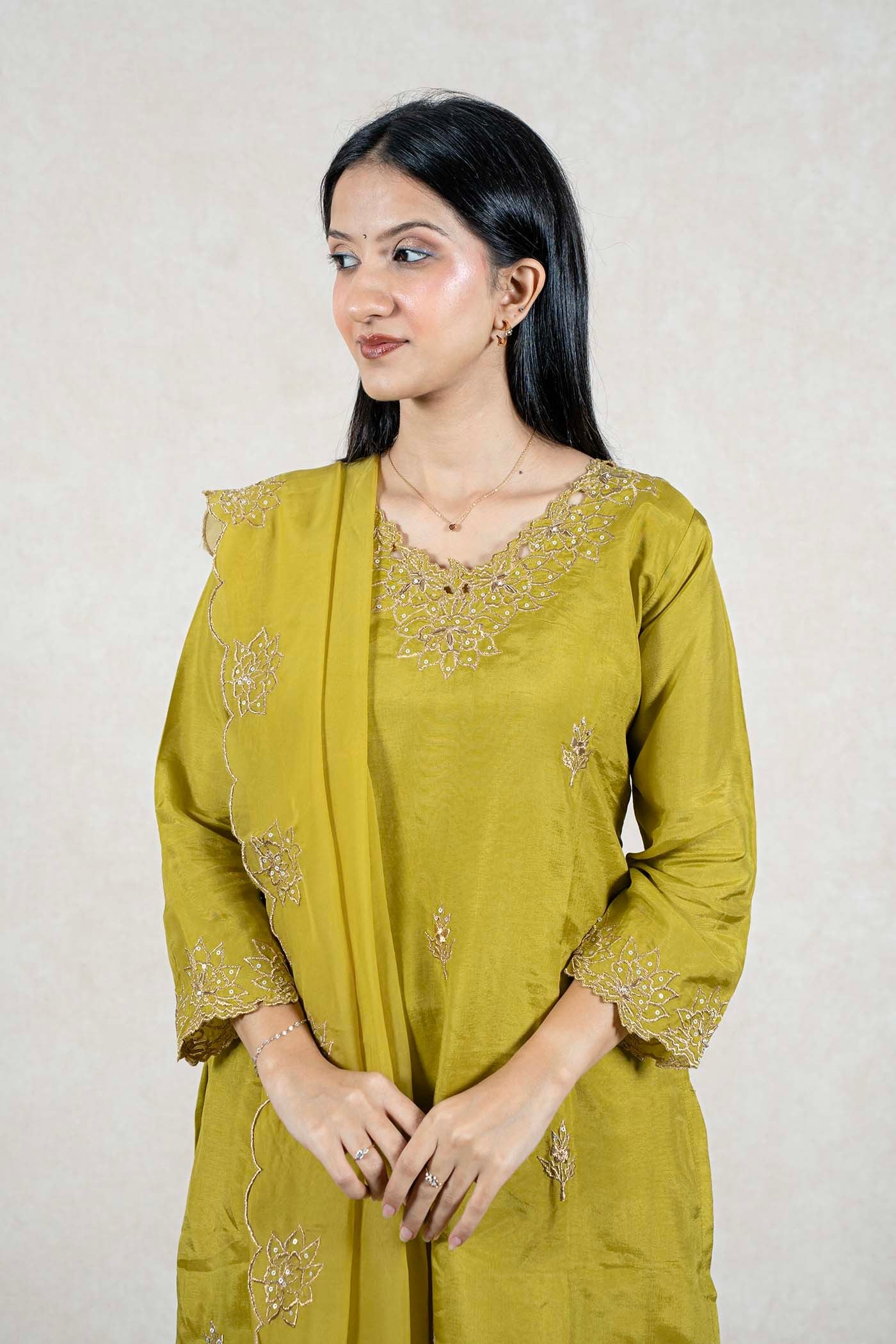 Raysham Fashion olive green silk blend kurta set featuring intricate gold embroidery on the neckline and sleeves