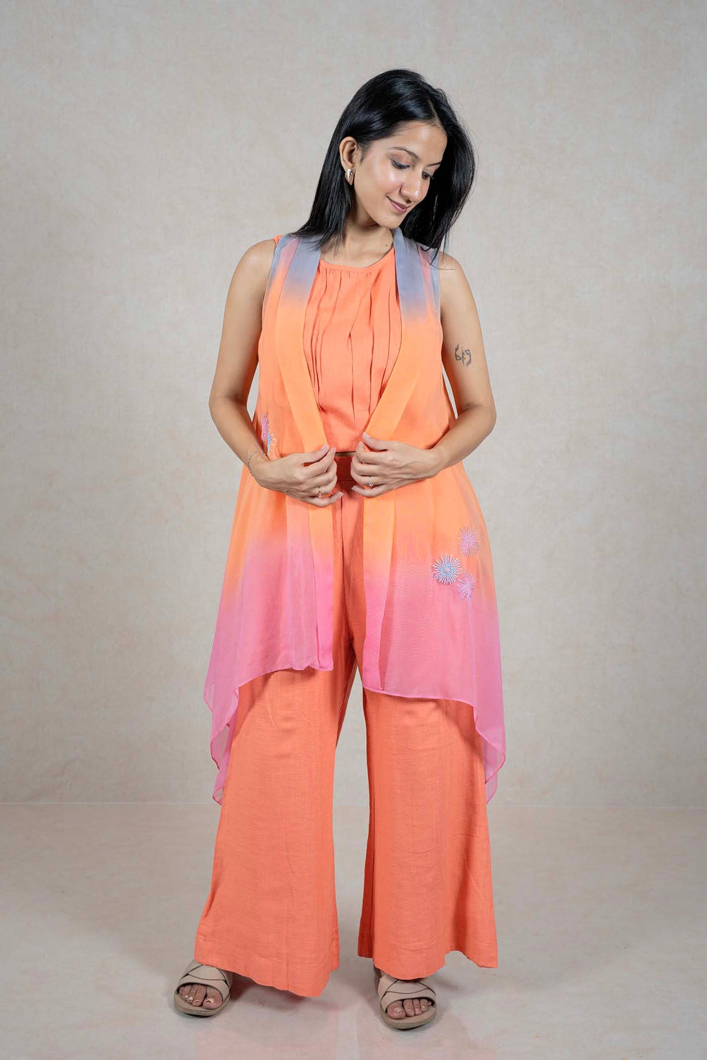 Raysham Fashion orange sleeveless top and wide leg trousers set with an ombre pink shrug featuring floral beadwork