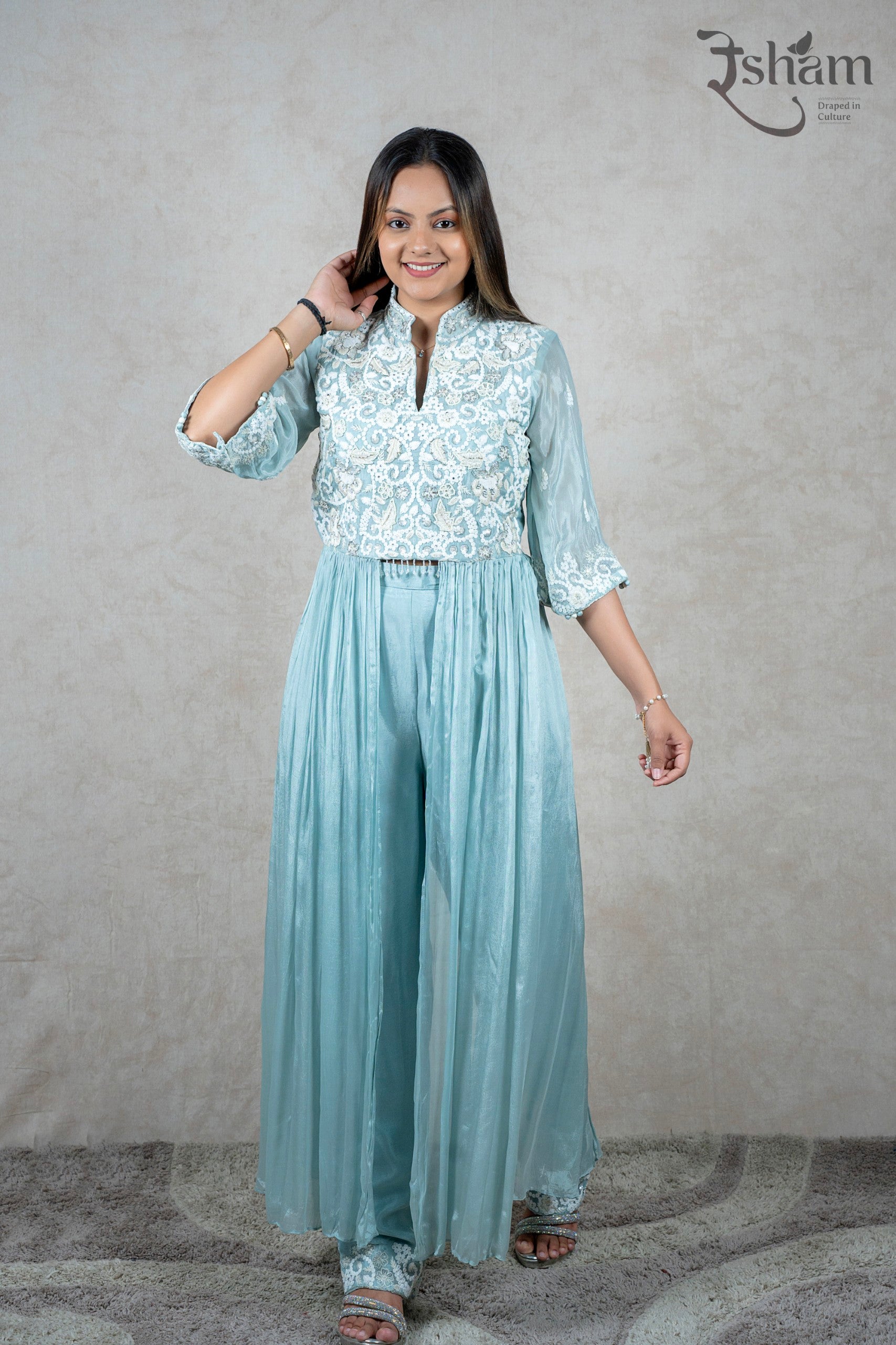 Raysham Fashion powder blue co-ord set with white floral embroidery, mandarin collar, and flared trousers.