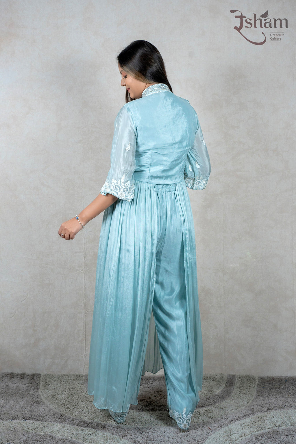 Raysham Fashion powder blue ethnic co-ord set with white floral embroidery on sleeves and flared trousers, back view