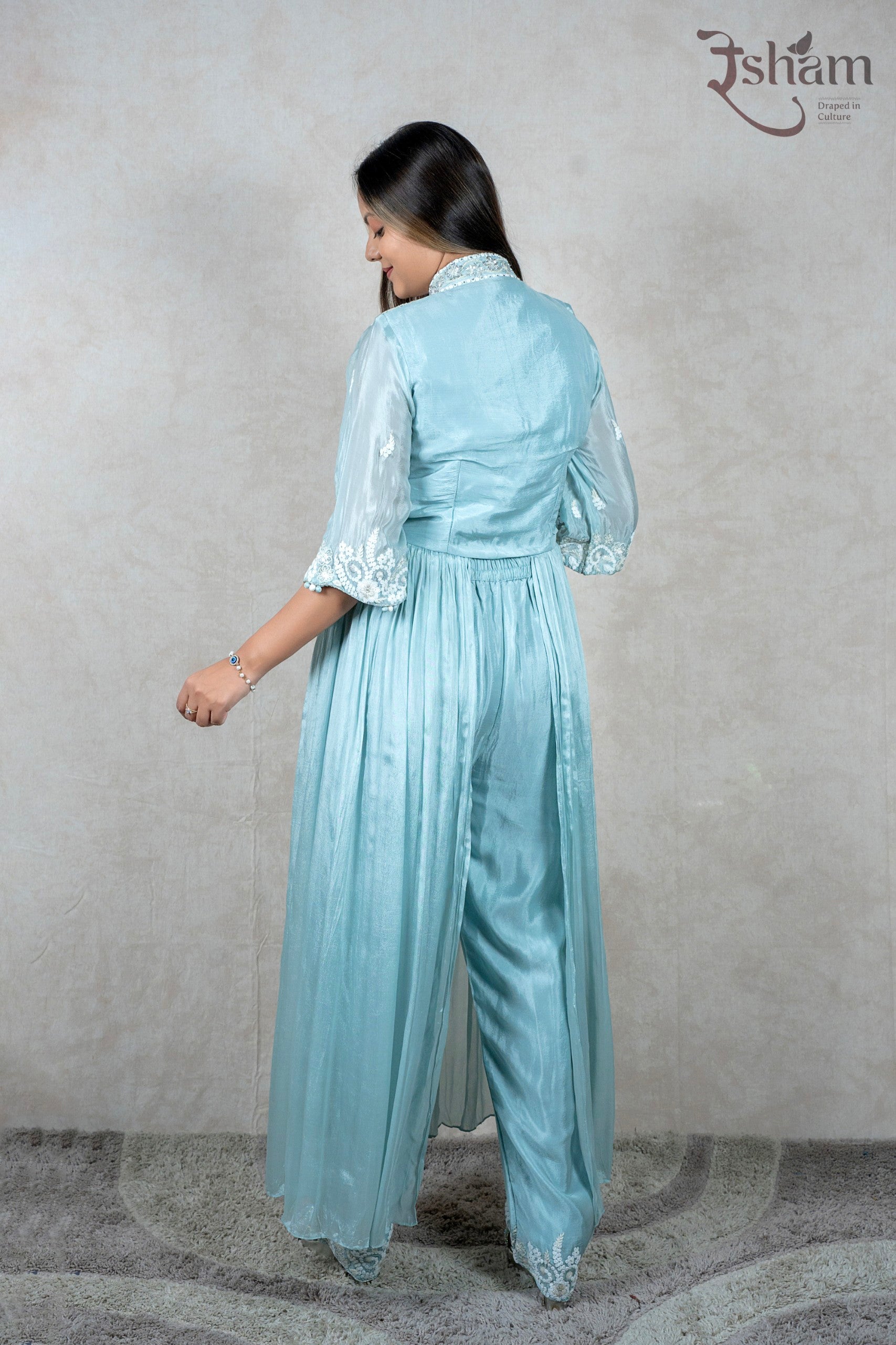 Raysham Fashion powder blue ethnic co-ord set with white floral embroidery on sleeves and flared trousers, back view