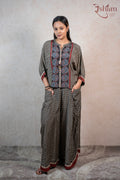 Raysham Fashion printed co-ord set with a geometric floral top and wide-leg trousers in black, red, and blue tones.