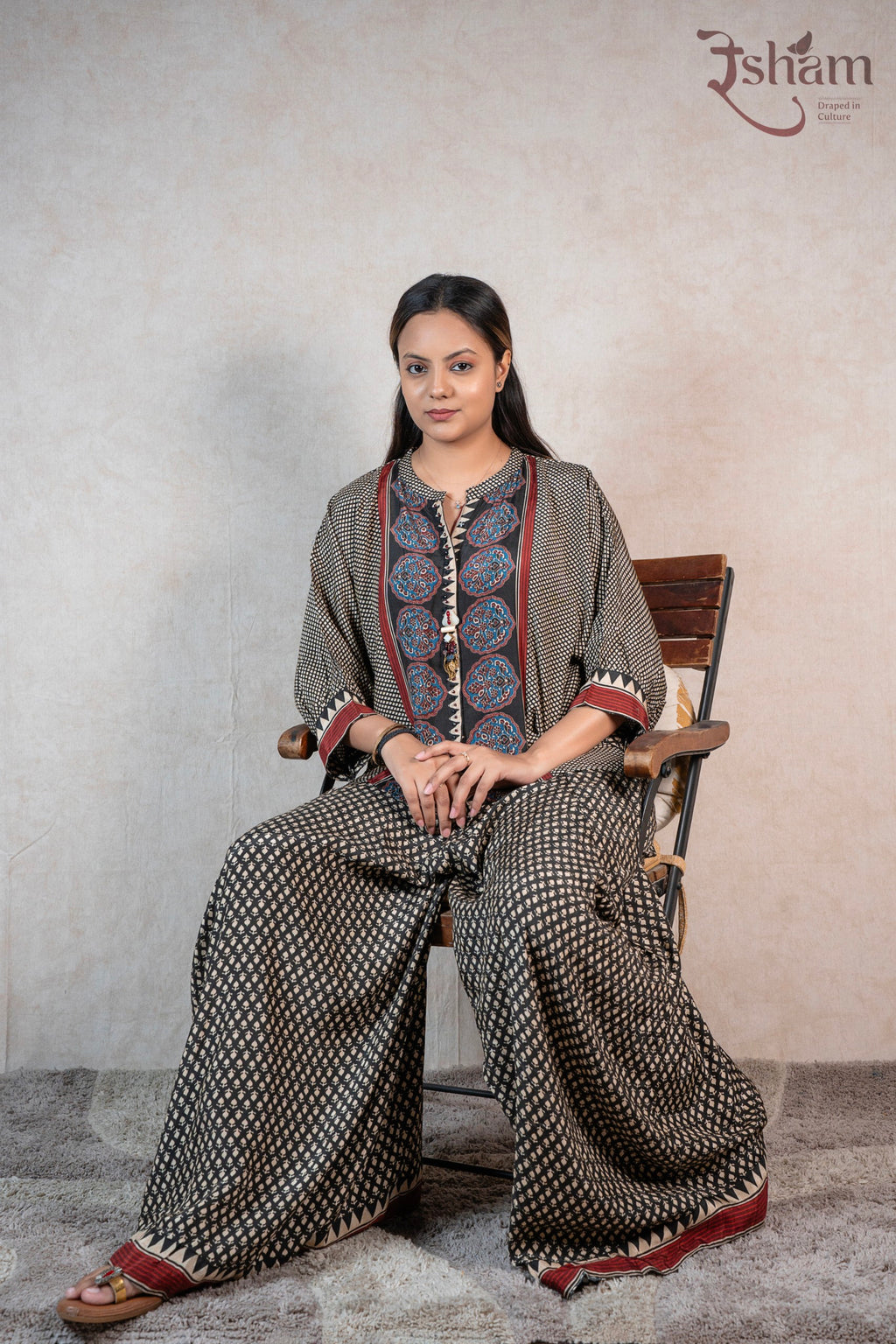 Raysham Fashion printed co-ord set with wide-leg trousers, featuring geometric patterns and floral motifs in black.