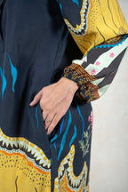 Raysham Fashion printed long sleeve maxi dress in charcoal black and mustard yellow with side pockets and elastic cuffs