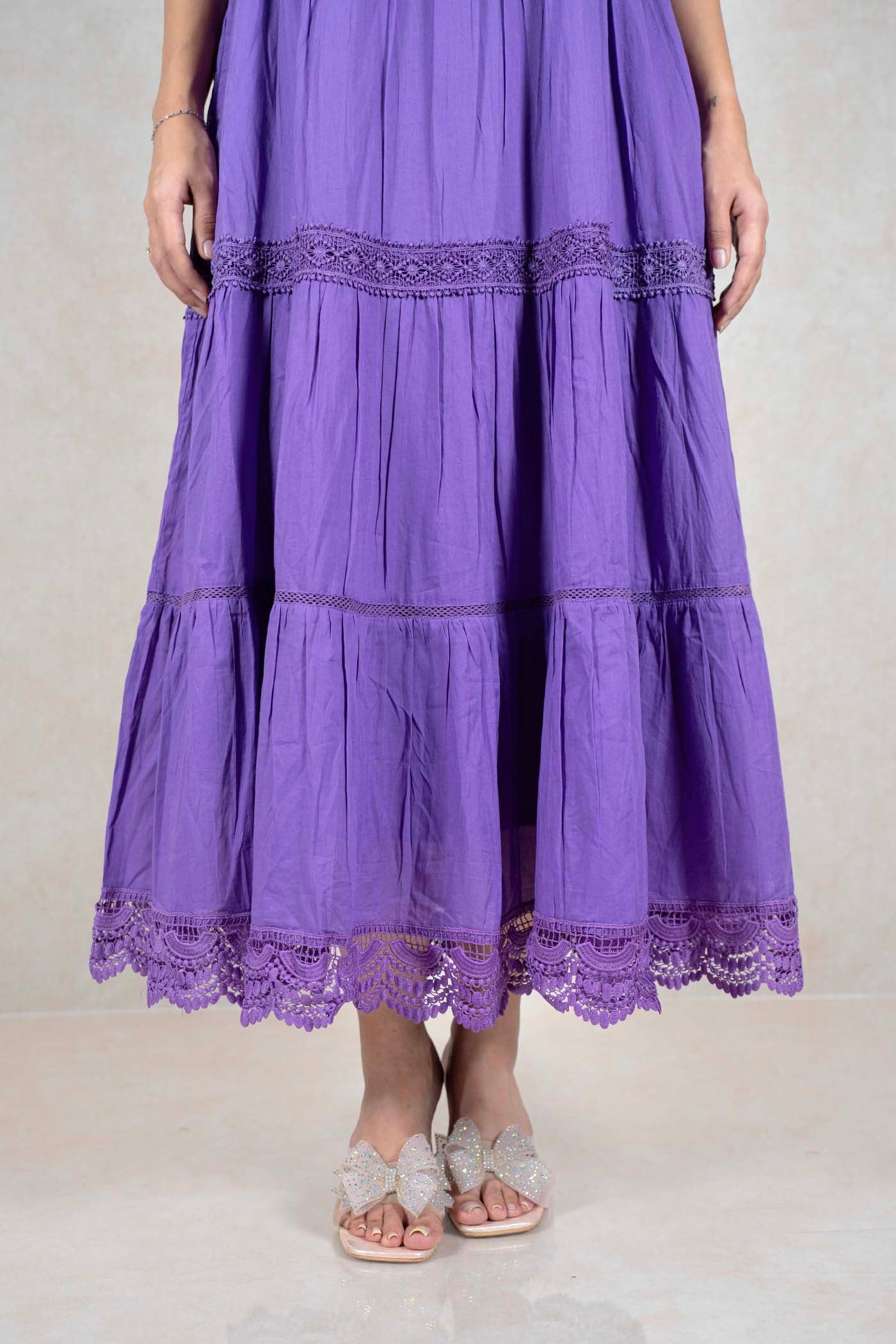 Raysham Fashion purple tiered midi dress with intricate lace trim and side pockets, worn with sparkly bow sandals.