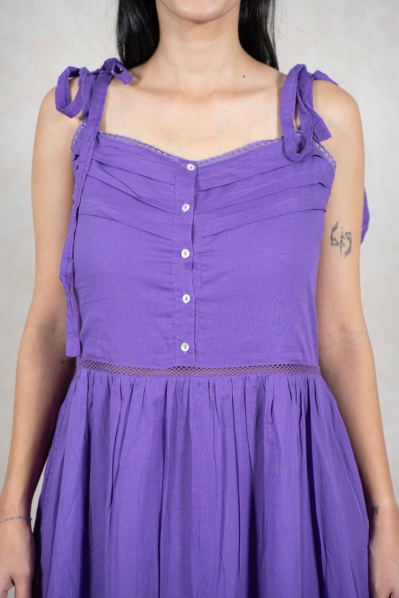 Raysham Fashion purple sleeveless midi dress with button-down bodice, tie-up straps, and delicate lace trim detailing.