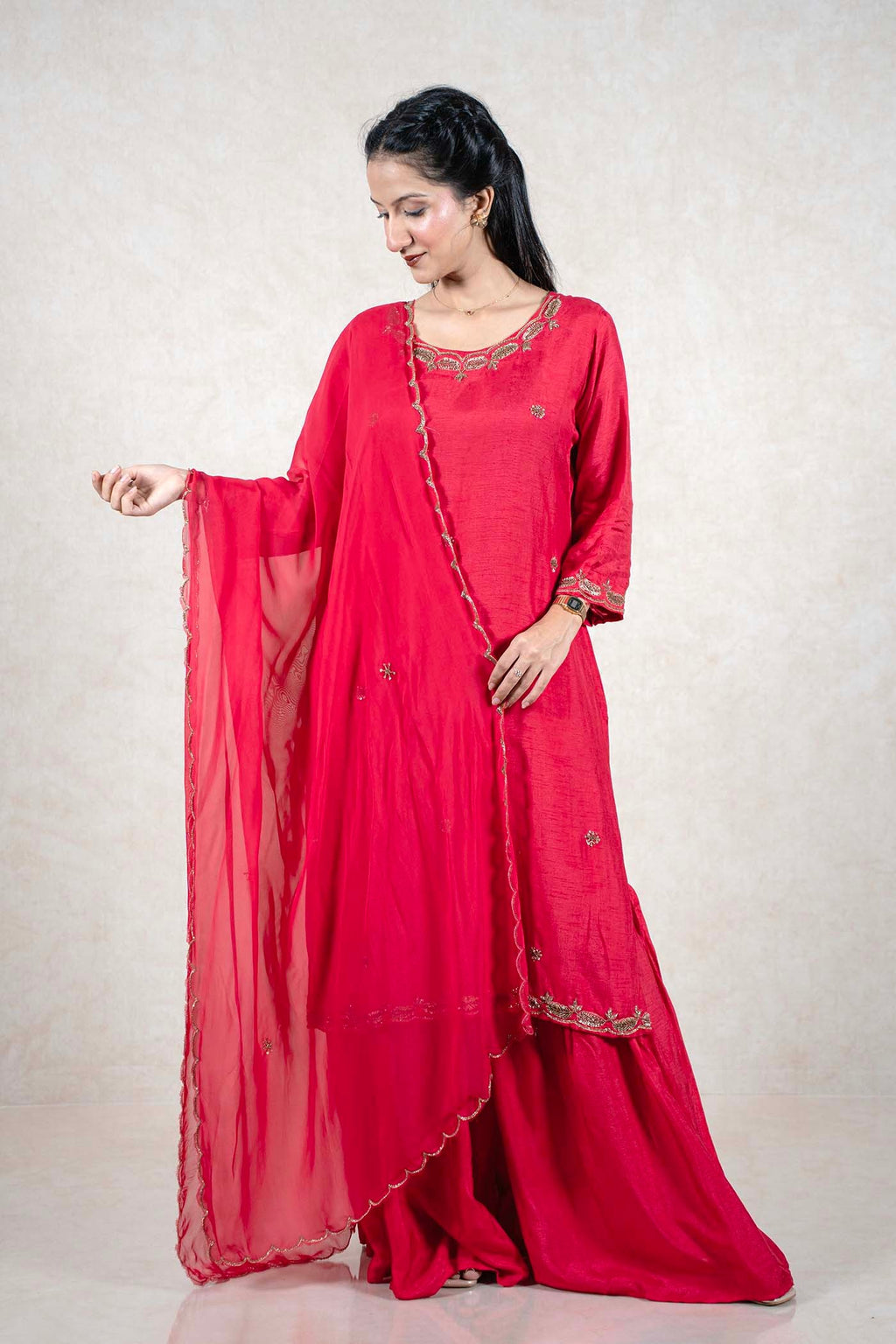 Raysham Fashion crimson red silk-blend kurta set with gold embroidery, floral motifs, and a scalloped edge dupatta.