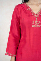 Raysham Fashion crimson red silk-blend kurta featuring intricate gold embroidery on the V-neckline and sleeves.