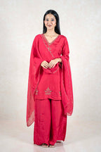 Raysham Fashion crimson red silk-blend kurta set with gold embroidery, palazzo pants, and a matching sheer dupatta.