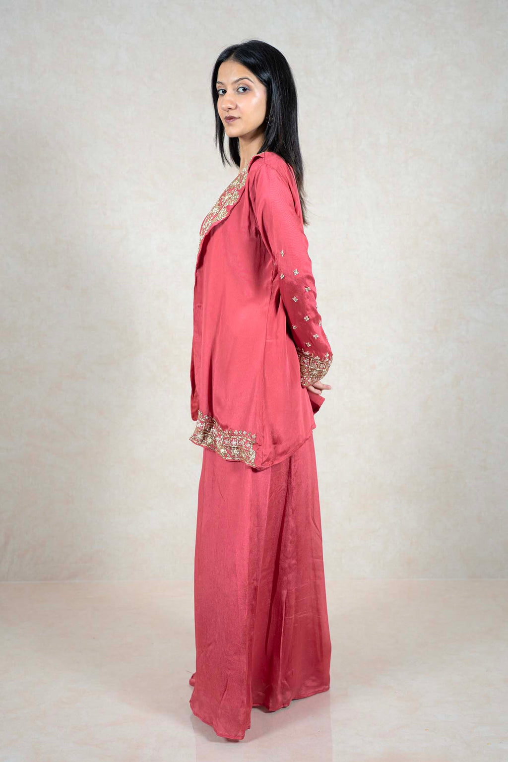 Raysham Fashion rose-pink embroidered jacket and palazzo set with gold-toned floral detailing on a model side view