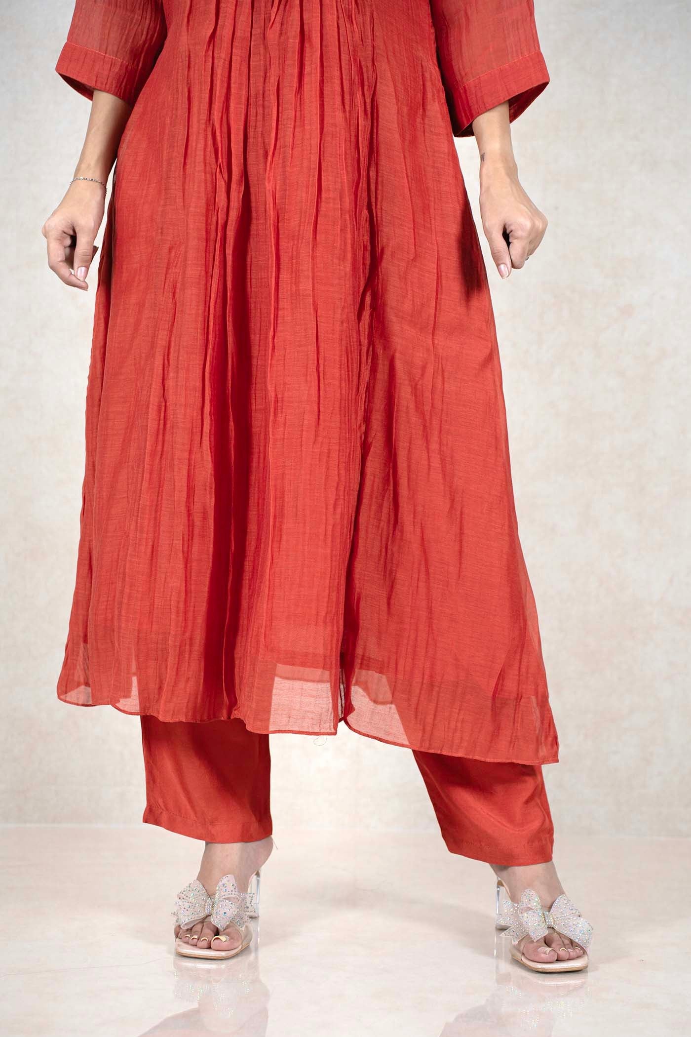 Raysham Fashion rust-orange ethnic kurta set with matching trousers and sheer fabric texture