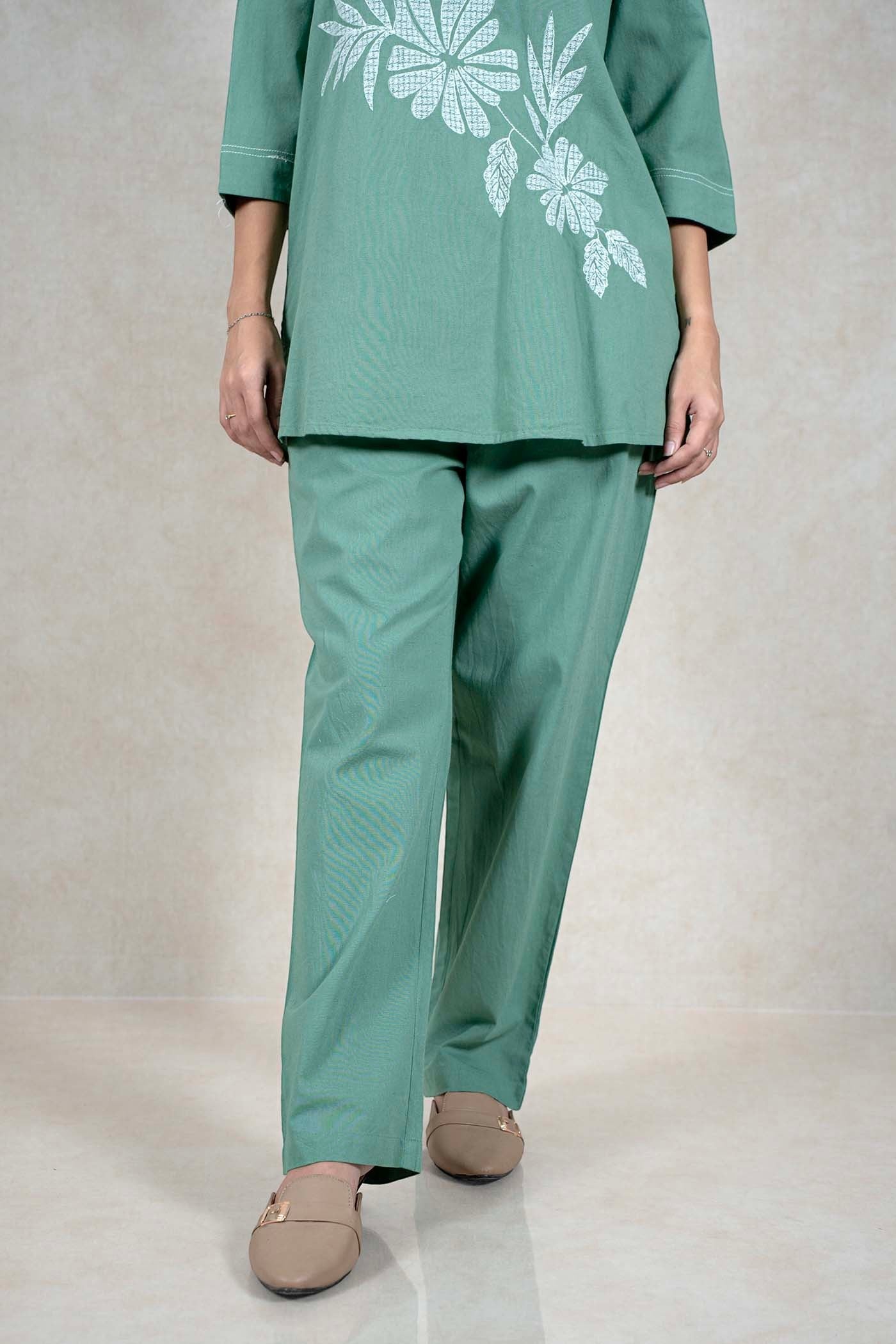 Raysham Fashion sage green two-piece co-ord set with white floral print, three-quarter sleeves, and relaxed trousers.