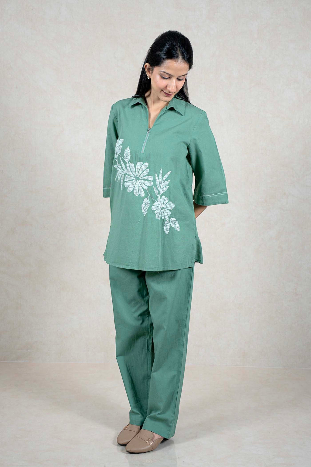 Raysham Fashion sage green two-piece co-ord set with zip-front tunic, floral print, and white contrast stitching.