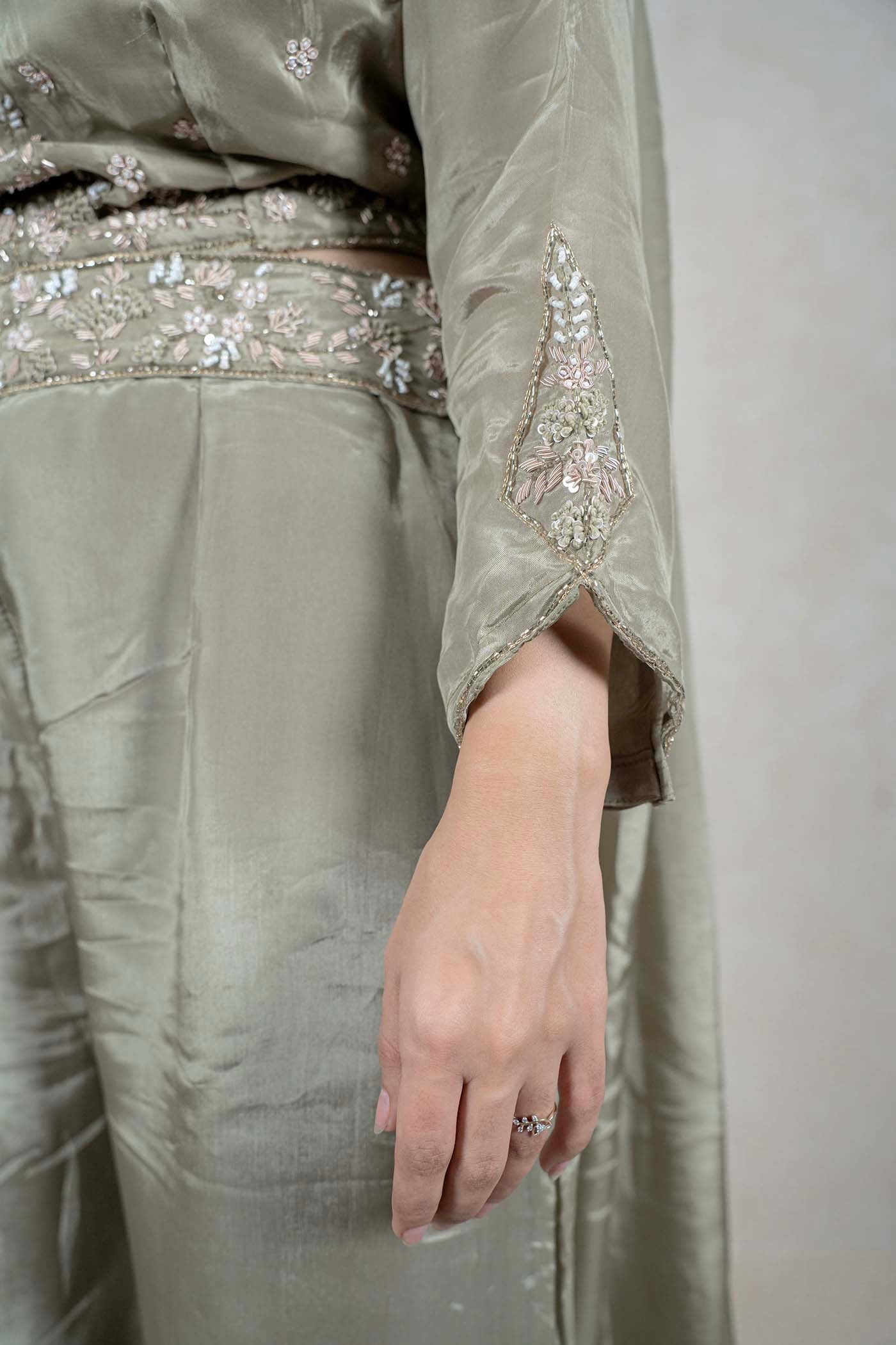 Raysham Fashion sage green silk co-ord set featuring intricate floral embroidery, beadwork, and sequin sleeve detail.