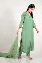 Raysham Fashion sage green silk kurta set with floral embroidery, V-neck, and matching sheer dupatta on a model.