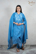 Raysham Fashion sky-blue cotton kurta set featuring white floral embroidery, lace trim, and a matching dupatta.