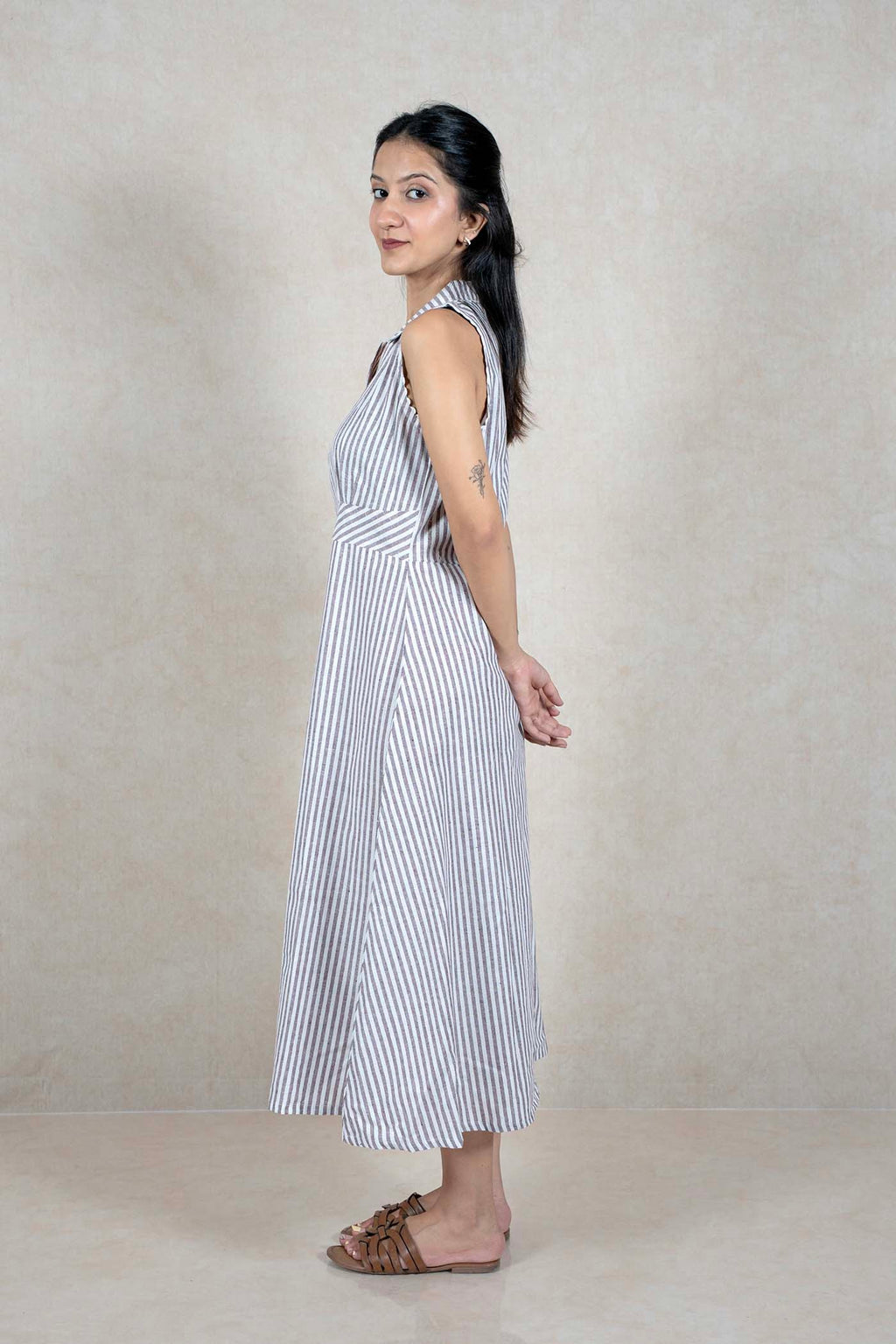Raysham Fashion sleeveless midi dress with vertical stripes, collared neckline, and scalloped armhole trim.