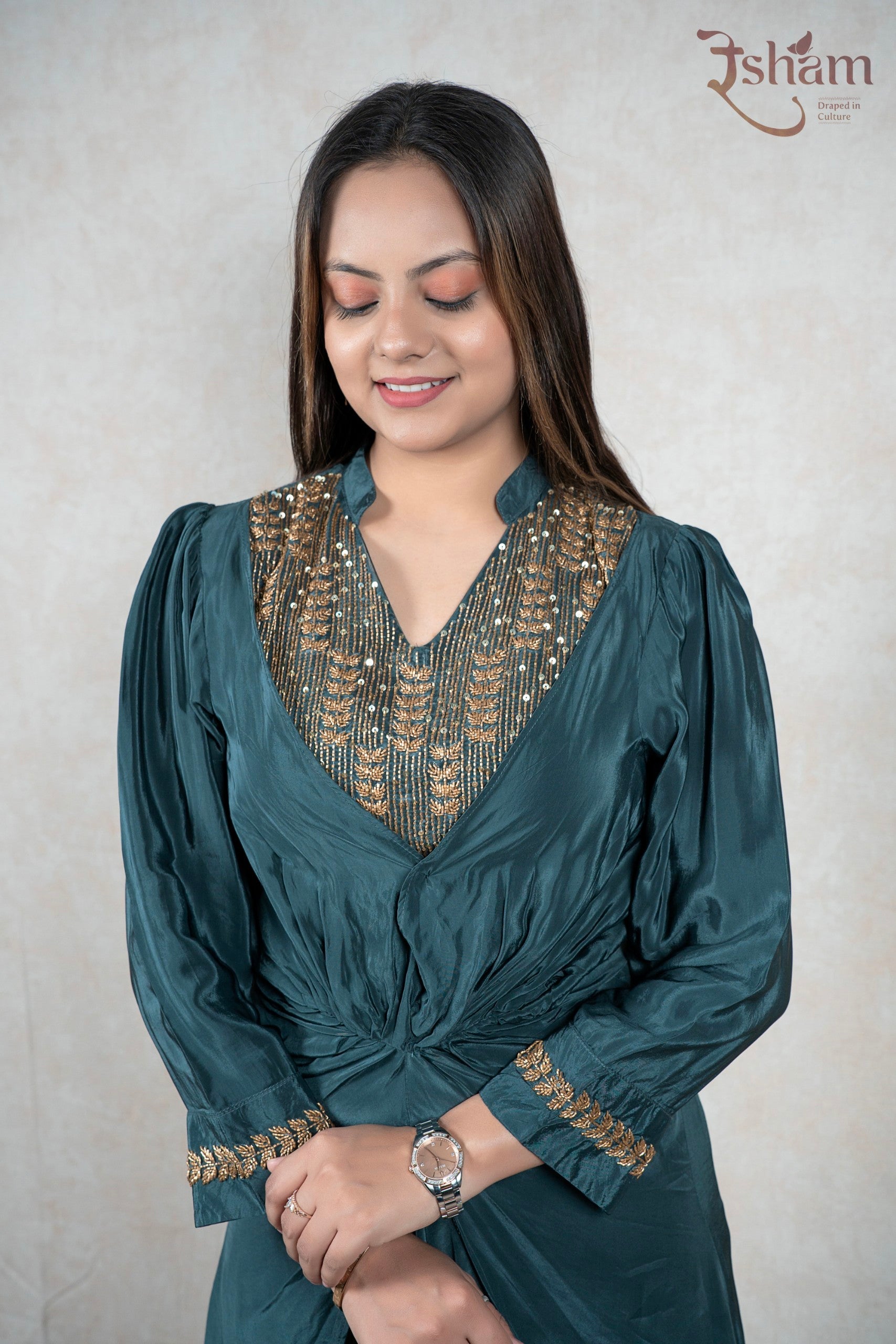 Raysham Fashion deep teal dhoti-style co-ord set with intricate gold embroidery on the V-neckline and sleeve cuffs.
