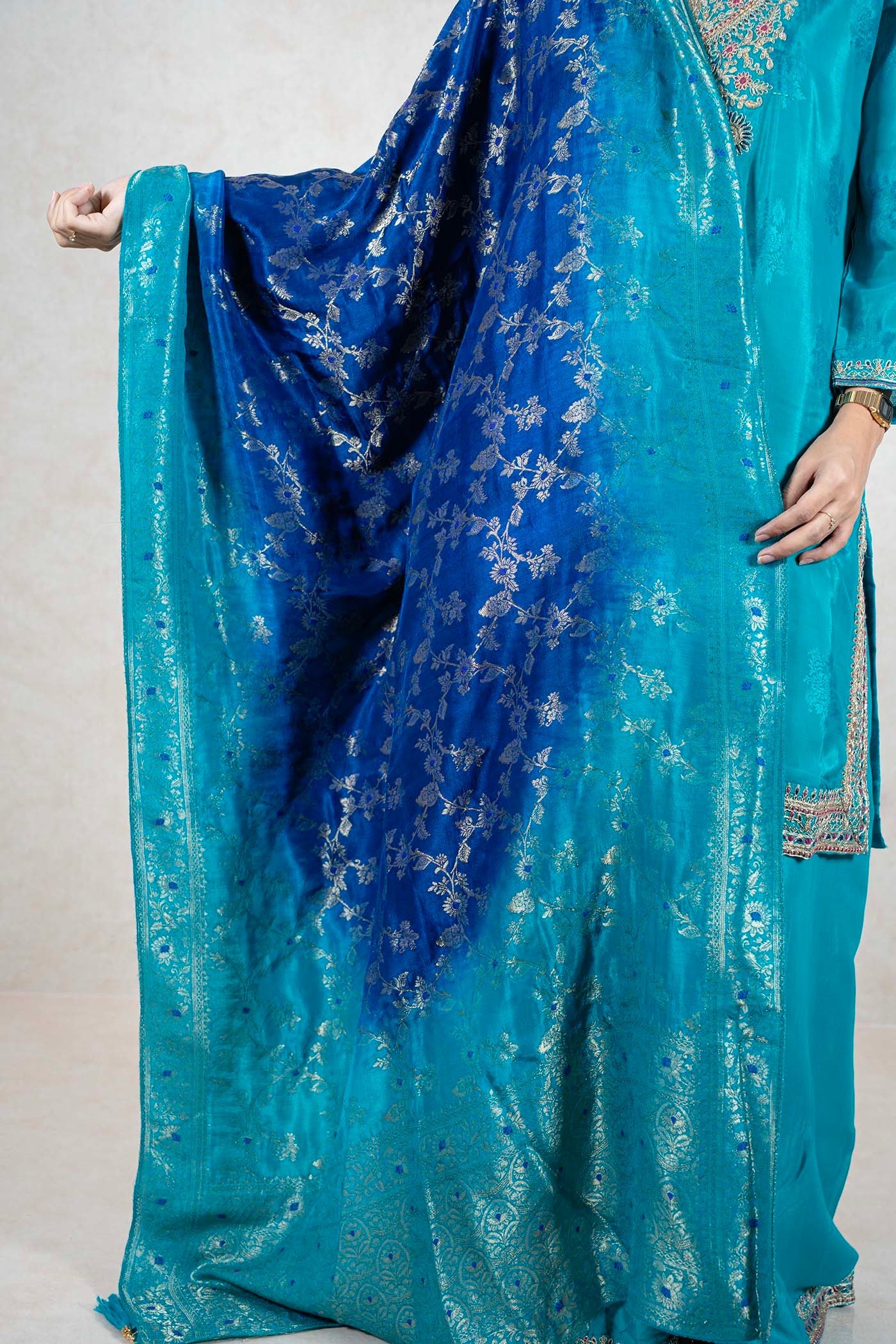 Raysham Fashion teal silk kurta set featuring an ombre dupatta with silver foil floral patterns and intricate embroidery