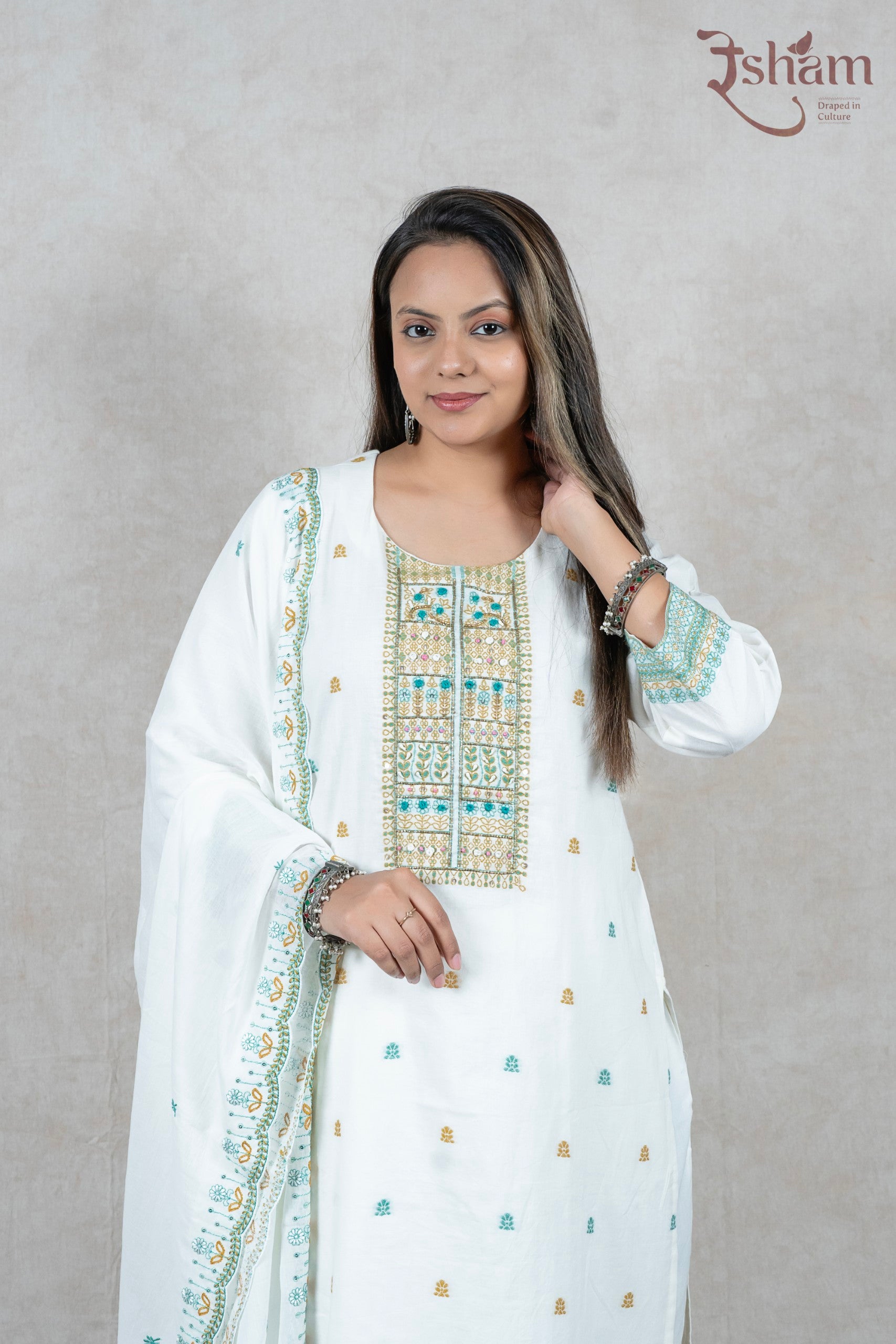 Raysham Fashion white cotton kurta set with multi-coloured embroidery on the yoke and sleeves and matching dupatta