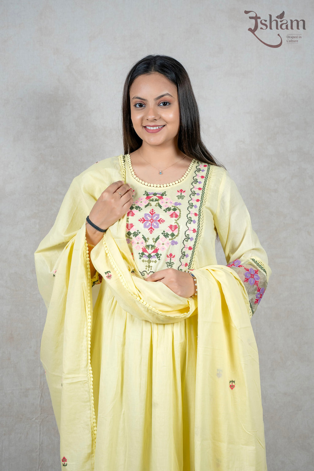Raysham Fashion pastel yellow cotton kurta set featuring floral embroidery on the yoke and sleeves with a dupatta