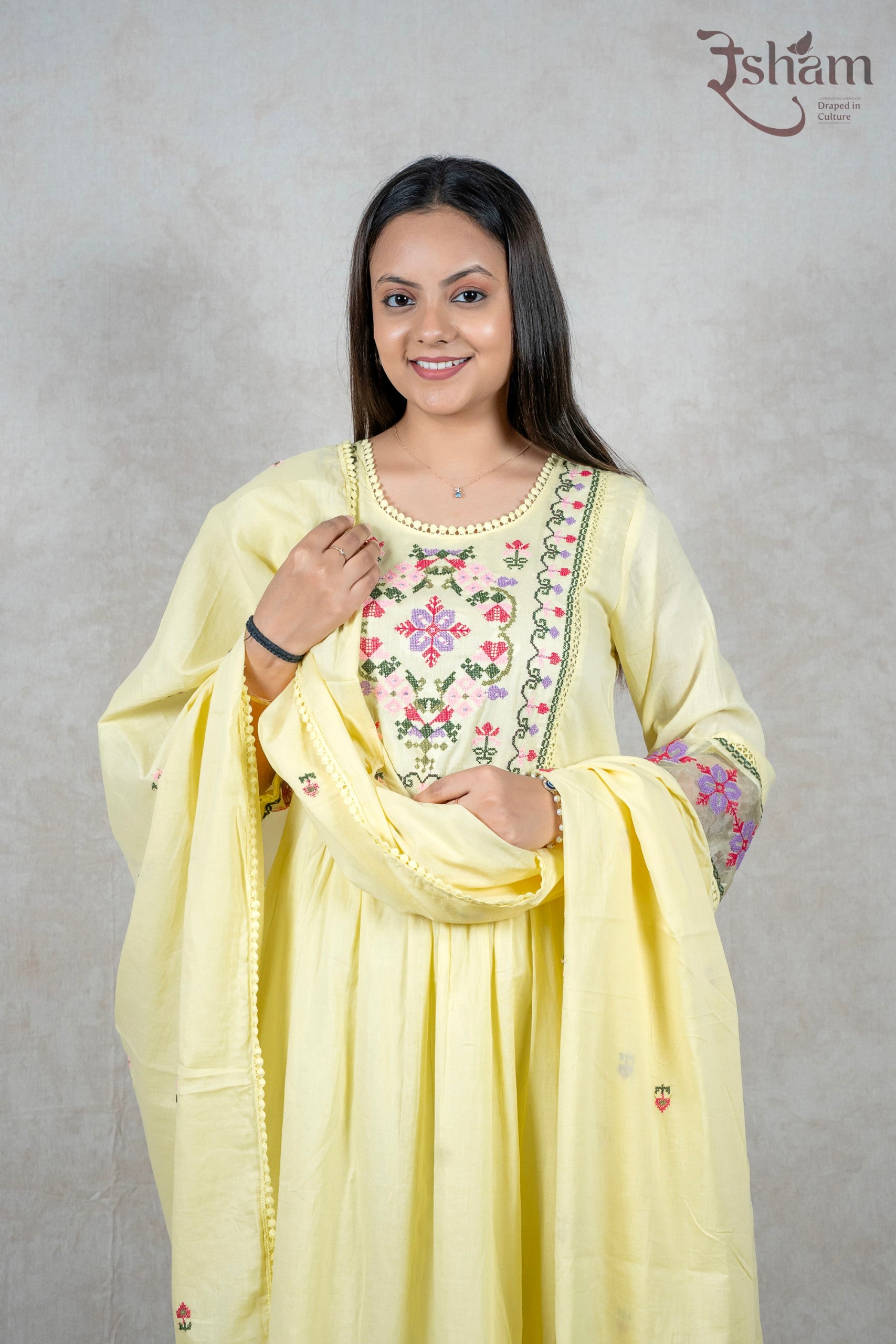 Raysham Fashion pastel yellow cotton kurta set featuring floral embroidery on the yoke and sleeves with a dupatta